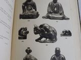 a book with pictures of various statues on it
