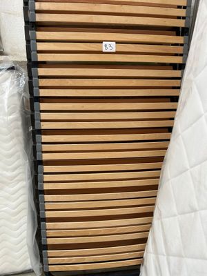 a lot of mattresses that are stacked on the floor