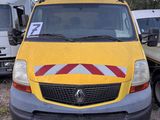 a yellow van that is parked in a parking lot