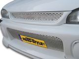 l'avant d'une voiture blanche munie d'une plaque d'immatriculation jaune
