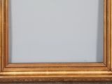 an image of a picture frame hanging on a wall in a room