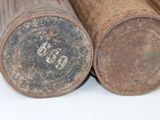 a close up of a couple of old baseball bats