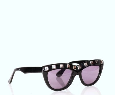 black cat eye sunglasses with silver studs and purple lenses