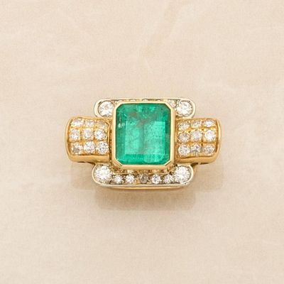an emerald and diamond ring