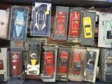 many different types of toy cars in a box