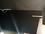 a black box with three lights on it sitting on a table