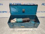 an old blue tool box with a drill in it