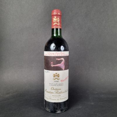 a bottle of wine that is sitting on a table