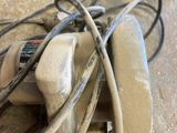 a bunch of wires that are tangled up on the floor
