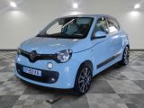 a picture of a small blue car parked on a checkered floor