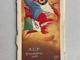 un vieux livre sur lequel figure l'image d'un groupe de drapeaux flottant au vent