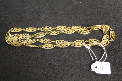 a close up of a gold chain with a tag on it