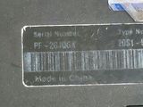 a picture of a metal plate with a barcode on it