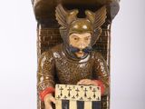 a statue of a man with a shield and shield