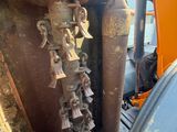 a close up view of a machine that is working on the ground