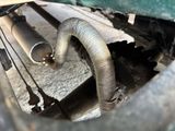 an image of a close up of the exhaust pipe of a car