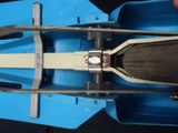 a close up view of a blue and white toy car