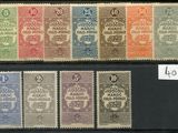 un ensemble de timbres de différentes couleurs et portant des numéros différents