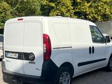 a white van that is parked in a parking lot
