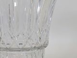 a glass vase that is sitting on a table