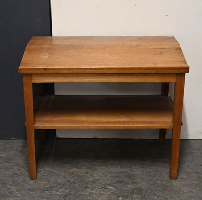 a small wooden table with a shelf underneath it