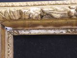 a picture of a gold frame on a black background