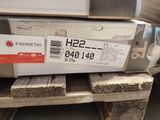 a stack of boxes on a pallet with a price tag
