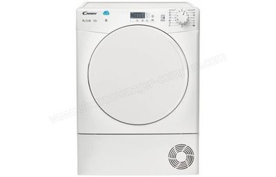 un sèche-linge blanc posé sur un mur blanc