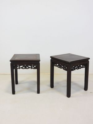 pair of chinese style side tables in the manner of person