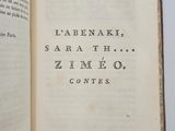 an open book with a black and white title on it