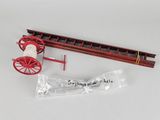 a small model of a fire engine with a ladder