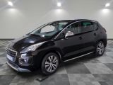 a picture of a black car parked in a garage