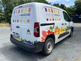 a van that is parked in the parking lot
