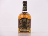 an image of a bottle of whisky sitting on top of a table