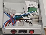 a box with wires and wires in it on a table
