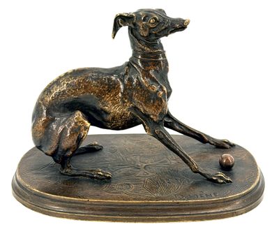 bronze statue of a greyhound dog on a base with a ball in its mouth