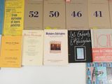 a lot of books that are on the table