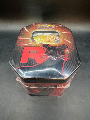 a tin box with a picture of a cat on it