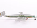 a toy airplane that is sitting on a white surface