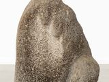 a large rock that is sitting on the ground