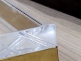 a close up of a piece of metal on a table
