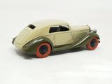 a toy car that is sitting on a white surface