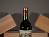 a bottle of wine that is sitting on a table