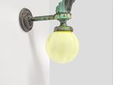 a light that is on the wall next to a door