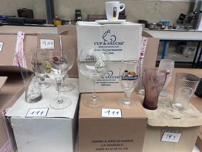 boxes of wine glasses and glasses are stacked on top of each other