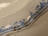 a white plate with a blue border on it