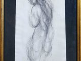 une image représentant un dessin d'une silhouette féminine dans un cadre doré
