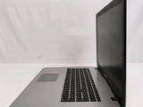 an open laptop computer sitting on top of a white table