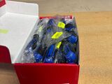 a box of assorted items sitting on a table