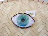a plastic eye that is sitting on top of a table